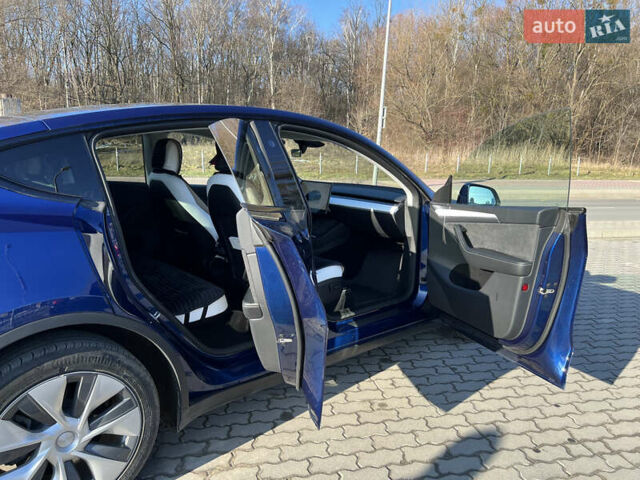 Синий Тесла Model Y, объемом двигателя 0 л и пробегом 17 тыс. км за 33500 $, фото 21 на Automoto.ua