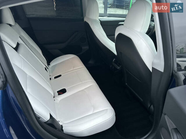 Синий Тесла Model Y, объемом двигателя 0 л и пробегом 48 тыс. км за 31600 $, фото 19 на Automoto.ua