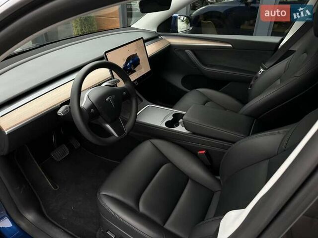 Синий Тесла Model Y, объемом двигателя 0 л и пробегом 10 тыс. км за 30494 $, фото 43 на Automoto.ua