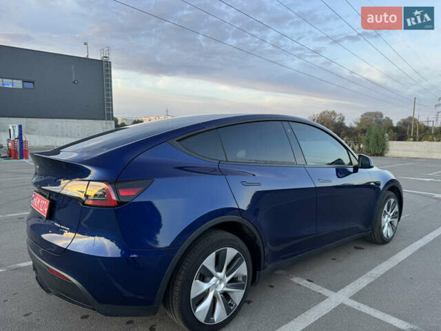 Синий Тесла Model Y, объемом двигателя 0 л и пробегом 60 тыс. км за 26900 $, фото 23 на Automoto.ua