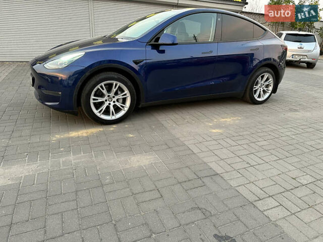 Синий Тесла Model Y, объемом двигателя 0 л и пробегом 27 тыс. км за 35999 $, фото 3 на Automoto.ua