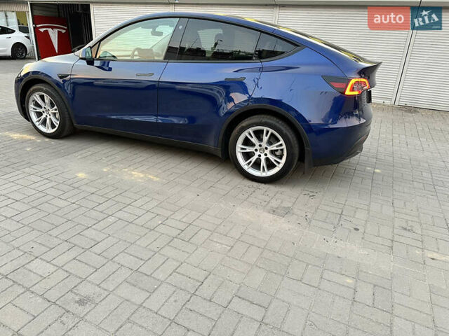 Синий Тесла Model Y, объемом двигателя 0 л и пробегом 27 тыс. км за 35999 $, фото 6 на Automoto.ua
