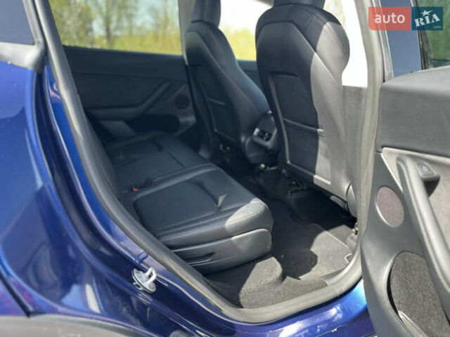 Синий Тесла Model Y, объемом двигателя 0 л и пробегом 28 тыс. км за 28819 $, фото 7 на Automoto.ua