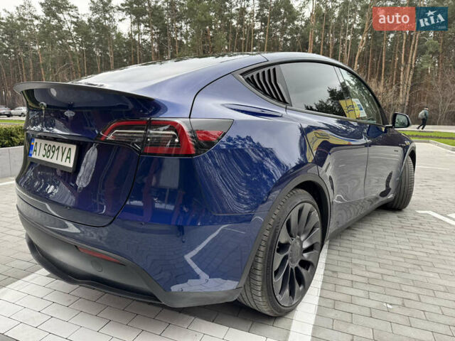 Синий Тесла Model Y, объемом двигателя 0 л и пробегом 18 тыс. км за 31200 $, фото 20 на Automoto.ua