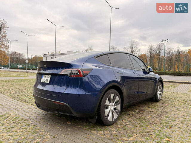 Синий Тесла Model Y, объемом двигателя 0 л и пробегом 46 тыс. км за 31900 $, фото 4 на Automoto.ua