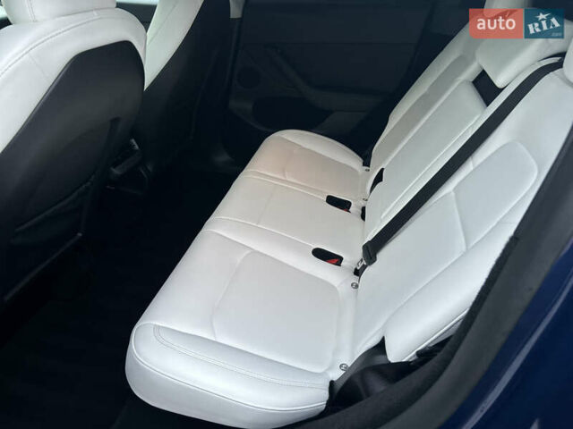 Синий Тесла Model Y, объемом двигателя 0 л и пробегом 48 тыс. км за 31600 $, фото 20 на Automoto.ua