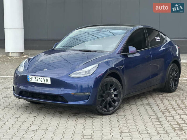 Синий Тесла Model Y, объемом двигателя 0 л и пробегом 36 тыс. км за 33000 $, фото 4 на Automoto.ua