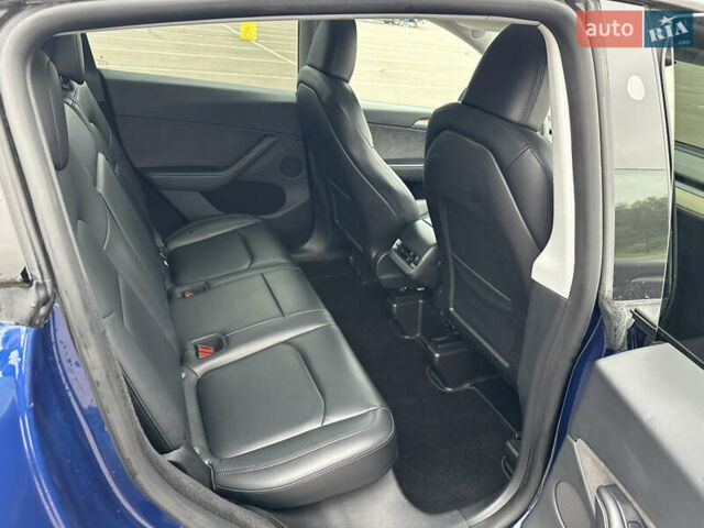 Синій Тесла Model Y, об'ємом двигуна 0 л та пробігом 81 тис. км за 25500 $, фото 17 на Automoto.ua