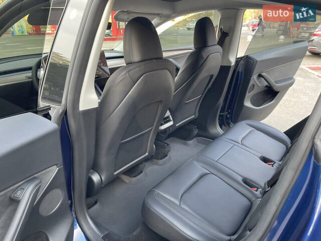 Синий Тесла Model Y, объемом двигателя 0 л и пробегом 17 тыс. км за 29600 $, фото 11 на Automoto.ua