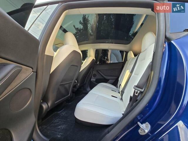 Синий Тесла Model Y, объемом двигателя 0 л и пробегом 51 тыс. км за 26400 $, фото 15 на Automoto.ua