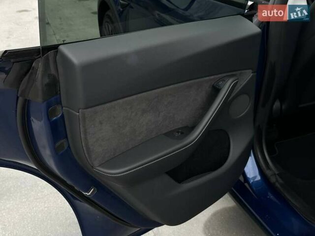 Синий Тесла Model Y, объемом двигателя 0 л и пробегом 10 тыс. км за 30494 $, фото 67 на Automoto.ua