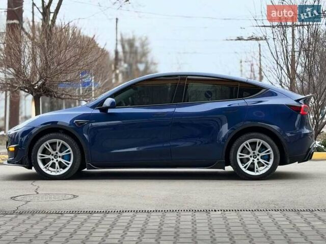 Синий Тесла Model Y, объемом двигателя 0 л и пробегом 14 тыс. км за 27600 $, фото 1 на Automoto.ua