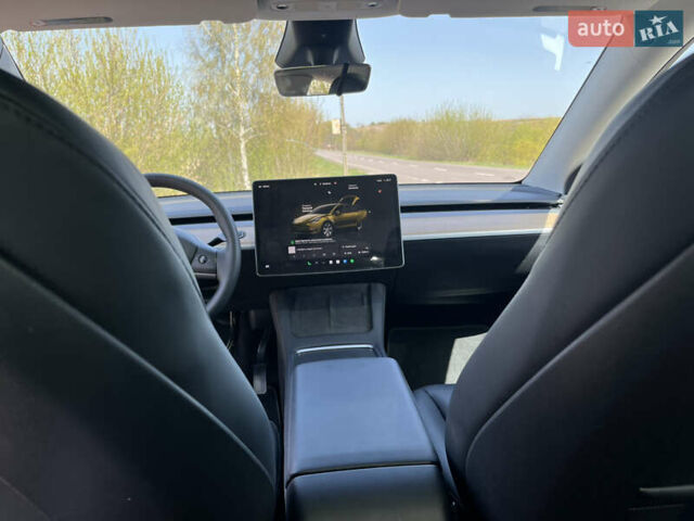 Синий Тесла Model Y, объемом двигателя 0 л и пробегом 28 тыс. км за 28819 $, фото 2 на Automoto.ua