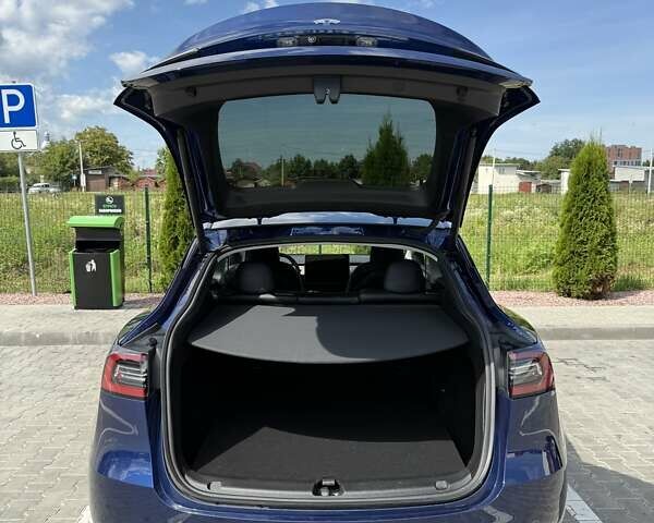 Синий Тесла Model Y, объемом двигателя 0 л и пробегом 13 тыс. км за 28500 $, фото 12 на Automoto.ua