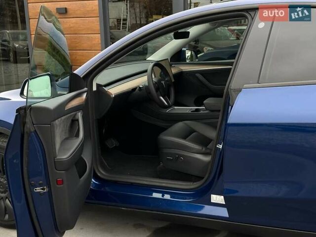 Синий Тесла Model Y, объемом двигателя 0 л и пробегом 10 тыс. км за 30494 $, фото 37 на Automoto.ua