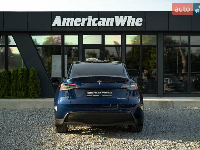 Синий Тесла Model Y, объемом двигателя 0 л и пробегом 79 тыс. км за 31900 $, фото 5 на Automoto.ua