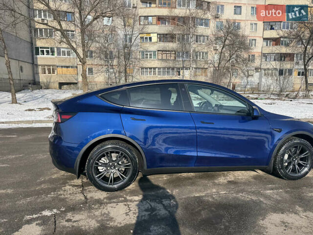 Синий Тесла Model Y, объемом двигателя 0 л и пробегом 21 тыс. км за 26500 $, фото 19 на Automoto.ua