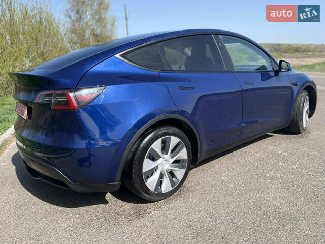 Синий Тесла Model Y, объемом двигателя 0 л и пробегом 28 тыс. км за 28819 $, фото 22 на Automoto.ua