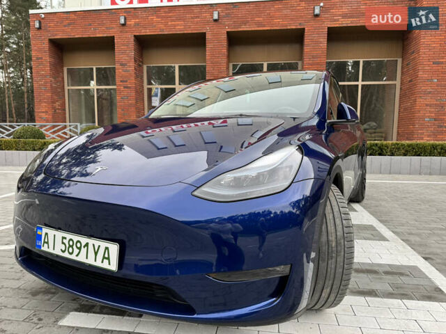 Синий Тесла Model Y, объемом двигателя 0 л и пробегом 18 тыс. км за 31200 $, фото 3 на Automoto.ua