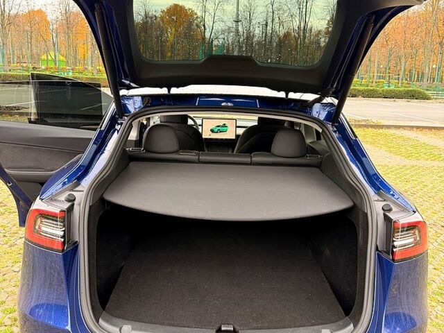 Синий Тесла Model Y, объемом двигателя 0 л и пробегом 46 тыс. км за 31900 $, фото 6 на Automoto.ua