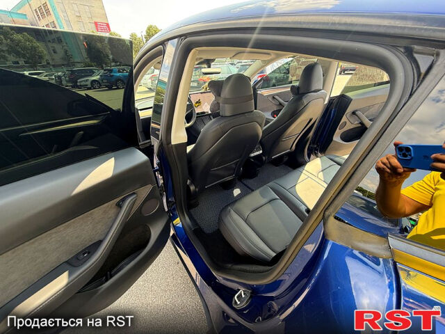 Синий Тесла Model Y, объемом двигателя 0 л и пробегом 26 тыс. км за 30000 $, фото 12 на Automoto.ua