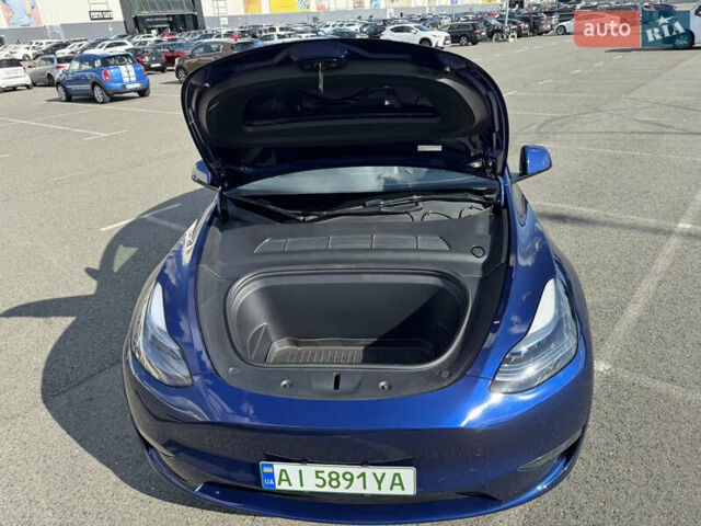 Синий Тесла Model Y, объемом двигателя 0 л и пробегом 17 тыс. км за 32500 $, фото 15 на Automoto.ua
