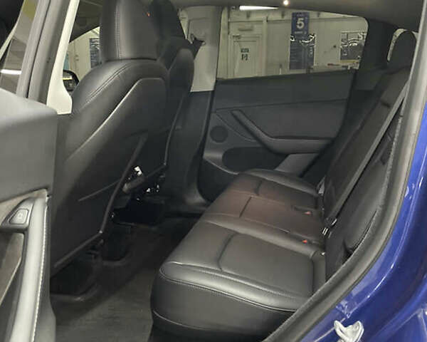 Синий Тесла Model Y, объемом двигателя 0 л и пробегом 51 тыс. км за 28500 $, фото 16 на Automoto.ua