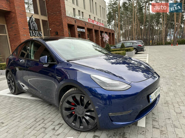 Синий Тесла Model Y, объемом двигателя 0 л и пробегом 18 тыс. км за 31200 $, фото 15 на Automoto.ua