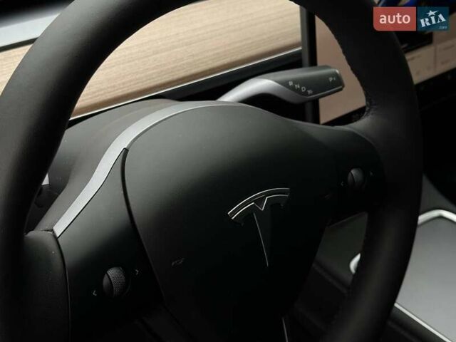 Синий Тесла Model Y, объемом двигателя 0 л и пробегом 10 тыс. км за 30494 $, фото 47 на Automoto.ua
