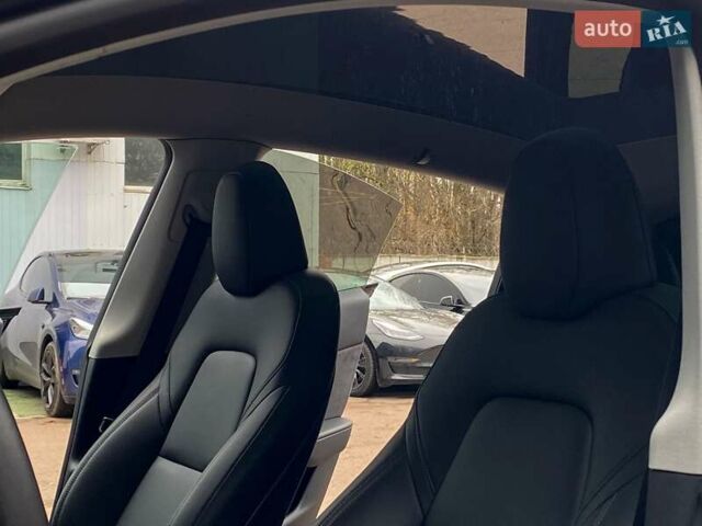Синий Тесла Model Y, объемом двигателя 0 л и пробегом 35 тыс. км за 30999 $, фото 13 на Automoto.ua