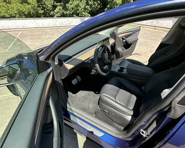 Синий Тесла Model Y, объемом двигателя 0 л и пробегом 15 тыс. км за 33000 $, фото 28 на Automoto.ua