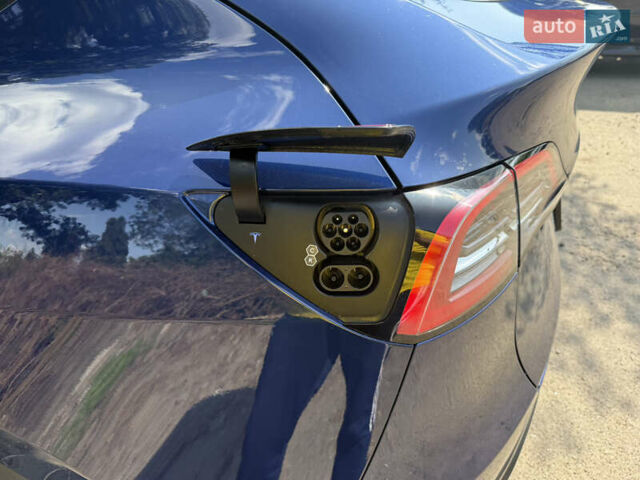 Синий Тесла Model Y, объемом двигателя 0 л и пробегом 26 тыс. км за 30000 $, фото 16 на Automoto.ua