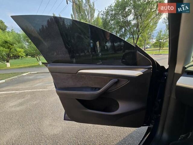 Синий Тесла Model Y, объемом двигателя 0 л и пробегом 51 тыс. км за 26400 $, фото 16 на Automoto.ua