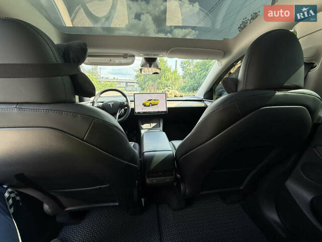 Синий Тесла Model Y, объемом двигателя 0 л и пробегом 26 тыс. км за 30000 $, фото 15 на Automoto.ua