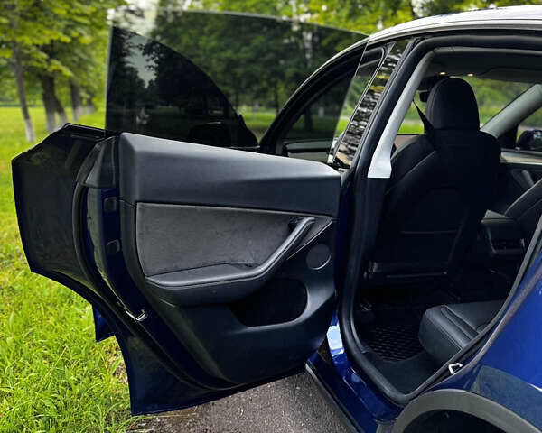 Синий Тесла Model Y, объемом двигателя 0 л и пробегом 26 тыс. км за 19900 $, фото 5 на Automoto.ua
