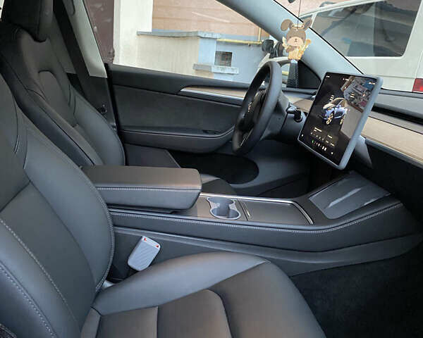 Синий Тесла Model Y, объемом двигателя 0 л и пробегом 15 тыс. км за 28200 $, фото 22 на Automoto.ua