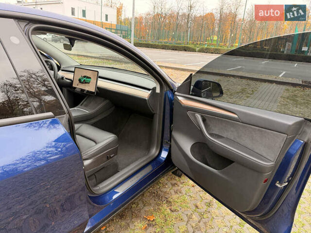Синий Тесла Model Y, объемом двигателя 0 л и пробегом 46 тыс. км за 31900 $, фото 12 на Automoto.ua