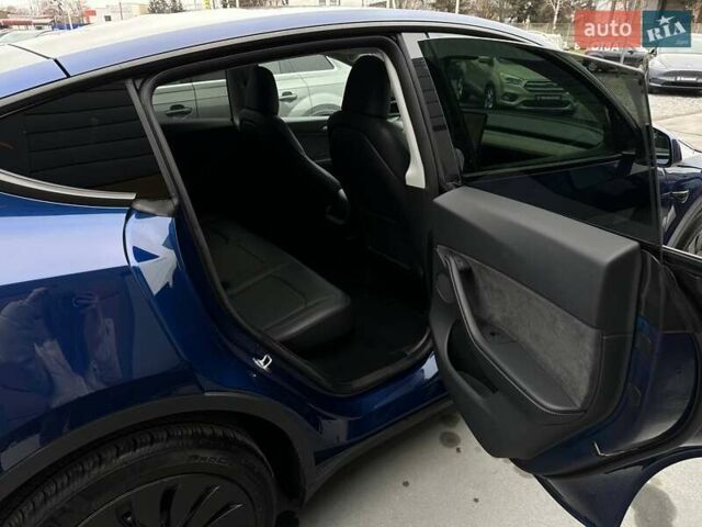 Синий Тесла Model Y, объемом двигателя 0 л и пробегом 10 тыс. км за 30994 $, фото 76 на Automoto.ua