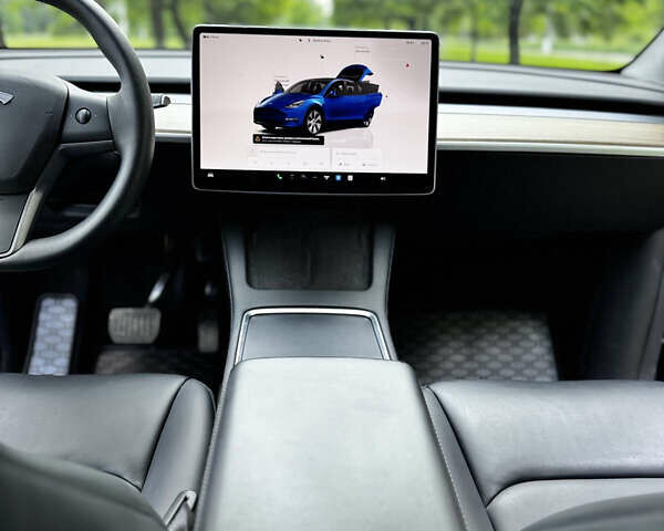 Синий Тесла Model Y, объемом двигателя 0 л и пробегом 26 тыс. км за 19900 $, фото 10 на Automoto.ua