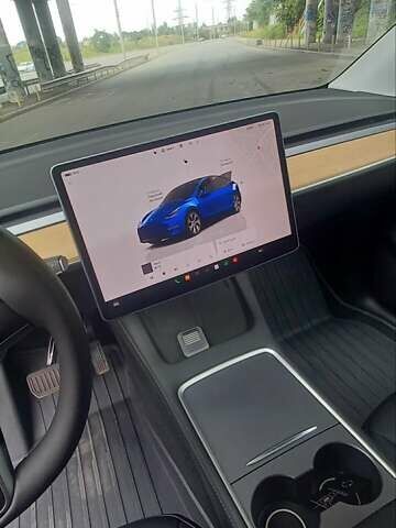 Синий Тесла Model Y, объемом двигателя 0 л и пробегом 9 тыс. км за 31000 $, фото 1 на Automoto.ua
