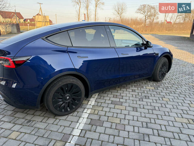 Синий Тесла Model Y, объемом двигателя 0 л и пробегом 27 тыс. км за 28100 $, фото 39 на Automoto.ua