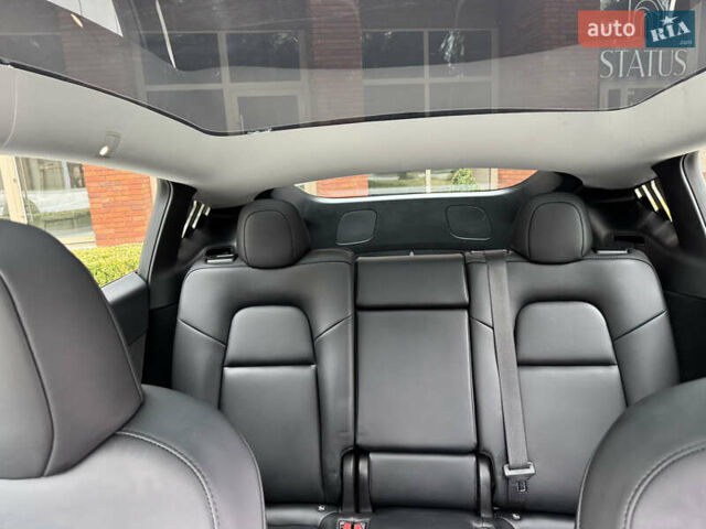 Синий Тесла Model Y, объемом двигателя 0 л и пробегом 17 тыс. км за 32500 $, фото 28 на Automoto.ua