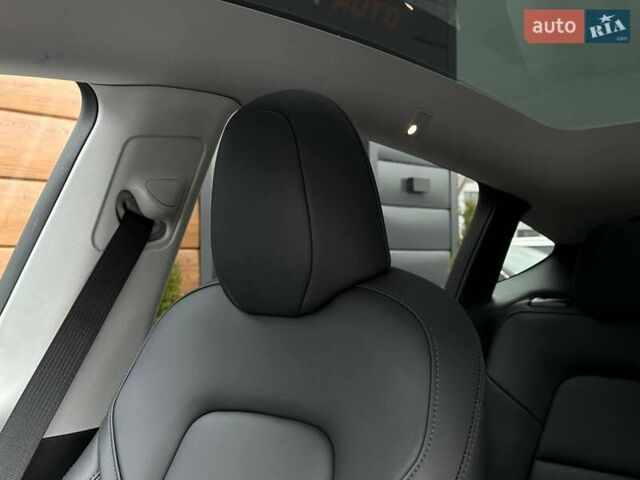 Синий Тесла Model Y, объемом двигателя 0 л и пробегом 10 тыс. км за 30494 $, фото 88 на Automoto.ua