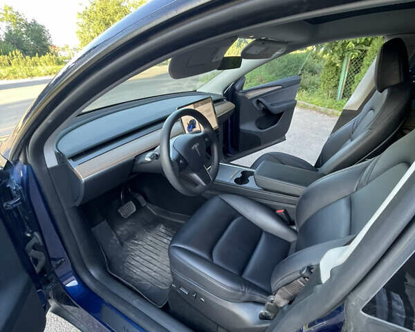 Синий Тесла Model Y, объемом двигателя 0 л и пробегом 55 тыс. км за 30500 $, фото 13 на Automoto.ua
