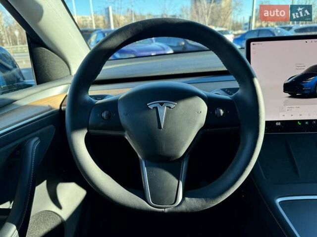 Синий Тесла Model Y, объемом двигателя 0 л и пробегом 48 тыс. км за 32990 $, фото 11 на Automoto.ua