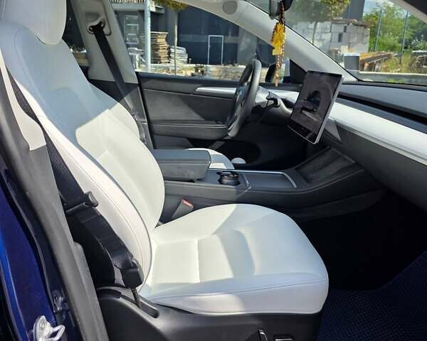 Синий Тесла Model Y, объемом двигателя 0 л и пробегом 42 тыс. км за 26500 $, фото 14 на Automoto.ua