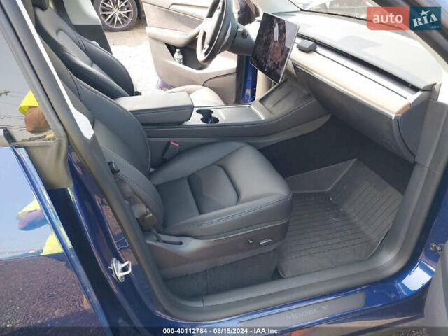 Синий Тесла Model Y, объемом двигателя 0 л и пробегом 17 тыс. км за 32500 $, фото 32 на Automoto.ua