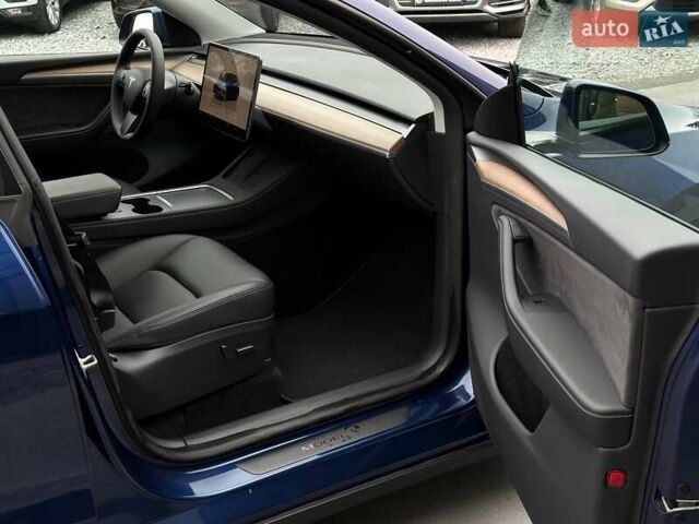 Синий Тесла Model Y, объемом двигателя 0 л и пробегом 10 тыс. км за 30494 $, фото 79 на Automoto.ua