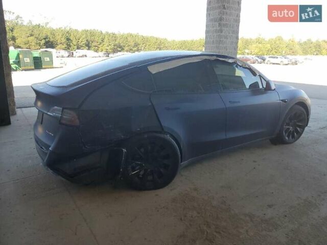 Синий Тесла Model Y, объемом двигателя 0 л и пробегом 23 тыс. км за 23000 $, фото 2 на Automoto.ua