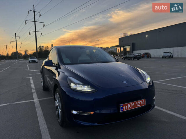 Синий Тесла Model Y, объемом двигателя 0 л и пробегом 60 тыс. км за 26900 $, фото 2 на Automoto.ua
